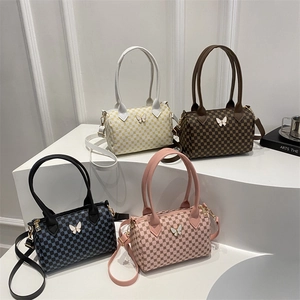 Boston style crossbody bags in four colors with geometric prints and 3D butterfly decor