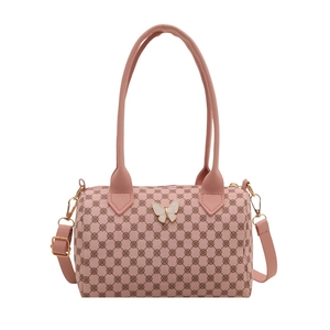 Pink vintage barrel bag with flower print and white butterfly metal accent
