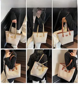 Multiple views of a large canvas tote bag with brown leather trim shown on model