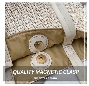 Detail of the golden magnetic buckle closure and neat stitching on a straw tote bag