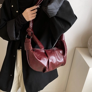 Retro burgundy large dumpling bag in soft shiny leather with knotted shoulder strap design