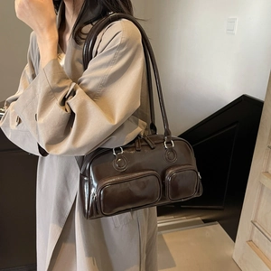Vintage brown glossy bowling shoulder bag with multiple pockets for daily commuting