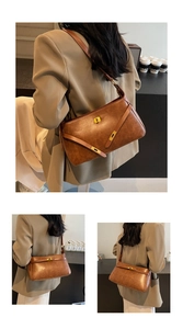 Dettaglio di una borsa Kelly in pelle marrone con chiusura a scatto dorata e trama fine