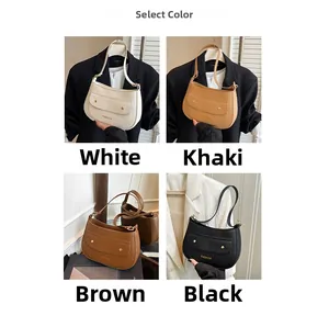 Close-up of four colors of women's crossbody crescent bags with lychee pattern leather