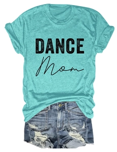 Detail of mint green T-shirt with DANCE MOM print paired with distressed denim shorts