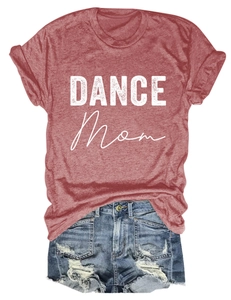 Close-up of DANCE MOM print on dark red t-shirt with distressed denim shorts