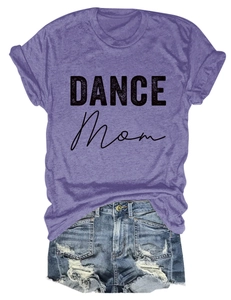 Flat lay of purple short sleeve DANCE MOM T-shirt with distressed denim shorts