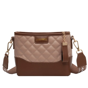 Chic quilted beige and brown bucket bag with wide patterned strap and gold chain detail