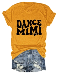 Close-up of ginger yellow crewneck T-shirt with Dance Mimi print and distressed denim shorts