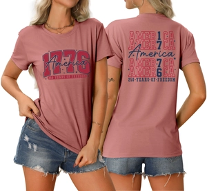 Detail of 1776 America 250 years freedom graphics on rose pink crew neck t-shirt