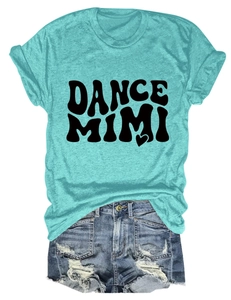 Flat lay of mint green crew neck t-shirt with Dance Mimi print and denim shorts