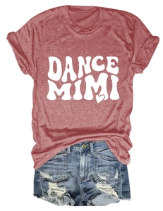 Flat lay of red round neck T-shirt with DANCE MIMI print and ripped denim shorts