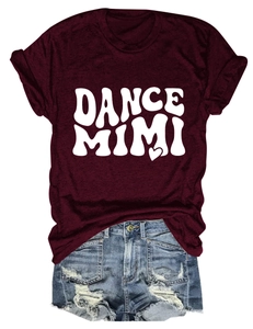 Flat lay of burgundy crew neck t-shirt with DANCE MIMI print and ripped denim shorts