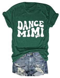 Close-up of deep green crewneck t-shirt and blue ripped denim shorts laid flat
