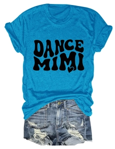 Flat lay of bright blue Dance Mimi cotton t-shirt with ripped denim shorts