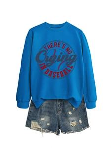 Detail of blue crewneck sweatshirt with baseball print and distressed denim shorts