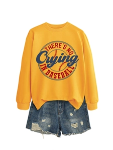 Flat lay of yellow long-sleeve sweatshirt with baseball slogan and denim shorts