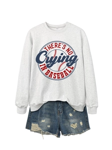 Detail view of grey sweatshirt with 'No Crying in Baseball' print and denim shorts