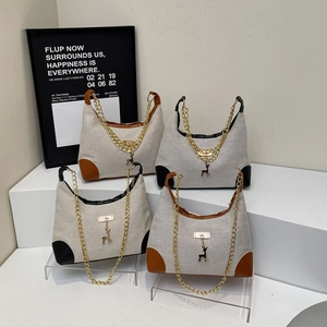 Grande borsa tote in tela stile francese con finiture in pelle e ciondolo cervo