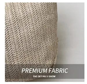 Close-up of the chevron weave texture on this stylish vintage bucket bag for beach vacations
