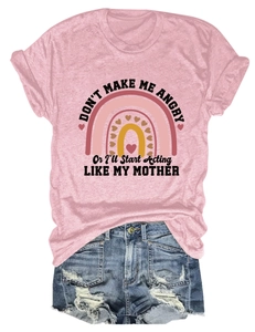 Detail of pink cotton T-shirt with funny quote and distressed denim shorts for women