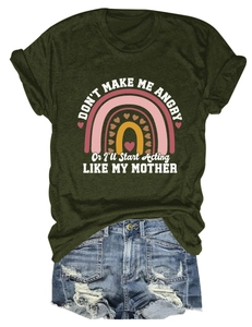 Detail of dark green cotton T-shirt with rainbow print and ripped blue denim shorts set