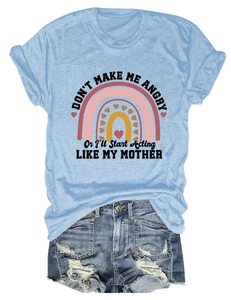 Detail of blue T-shirt with 'Don't Make Me Angry' text and distressed denim shorts