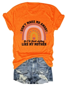Detail of orange t-shirt with rainbow graphic and humorous mother quote print