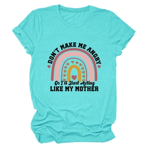 Close-up of funny slogan and rainbow heart print on turquoise women's cotton t-shirt