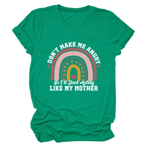 Close-up of green cotton t-shirt featuring rainbow print and humorous slogan text
