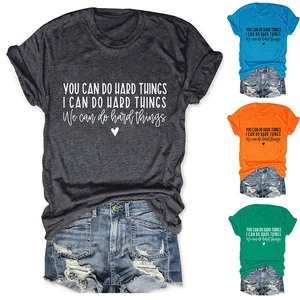 Detail of multi-color crewneck t-shirts with You Can Do Hard Things heart print
