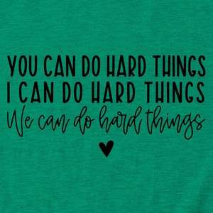 Detail of inspirational 'YOU CAN DO HARD THINGS' text print on green cotton t-shirt
