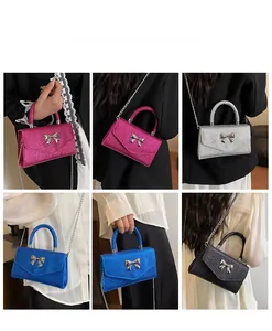 Fashion mini crossbody bag with metal bow and chain strap in four vibrant sequin colors