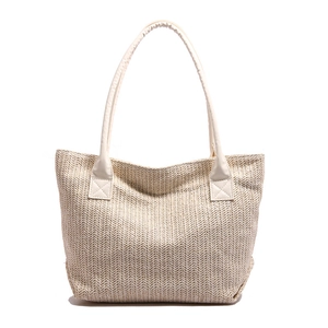 Retro woven bucket tote bag in beige with leather handles for women's spring beach fashion