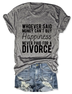 Flat lay of heather gray crew neck t-shirt with slogan and ripped denim shorts