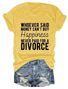 Flat lay view of a ginger yellow crew neck t-shirt with text and ripped denim shorts