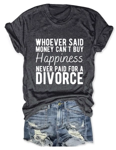 Flat lay of women's gray round neck T-shirt with white quote and ripped denim shorts