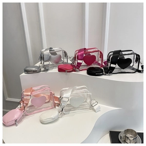 Detailed set of transparent PVC crossbody bags with heart patch and nylon straps