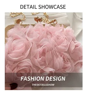 Detail of pink chiffon rose petals and vintage gold metal frame on a bridal clutch bag