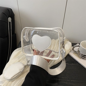 Borsa a tracolla trasparente in PVC bianco con toppa a cuore e cinturino in tessuto