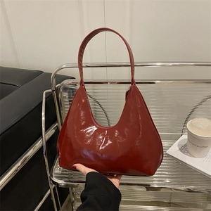 Glossy dark red faux leather hobo shoulder bag for urban fashion commute