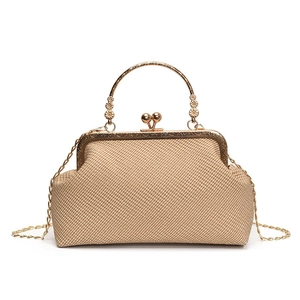 Vintage beige woven evening bag with gold floral handle and elegant chain strap
