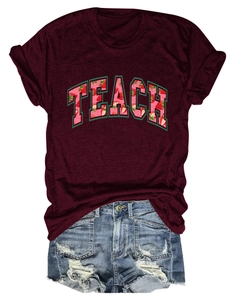 Detail of burgundy Teach t-shirt with strawberry letter print and denim shorts