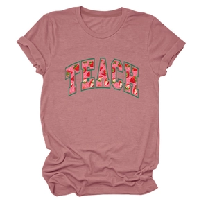 Close-up of strawberry filled TEACH letter print on dusty rose cotton blend T-shirt