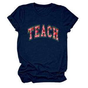 Detail of navy cotton T-shirt featuring TEACH lettering with red strawberry floral pattern