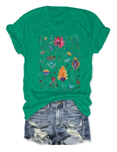 Detail of floral graphic print on green crewneck short sleeve casual summer t-shirt