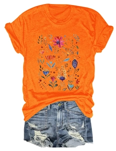 Detail of floral watercolor print on bright orange round neck short sleeve t-shirt