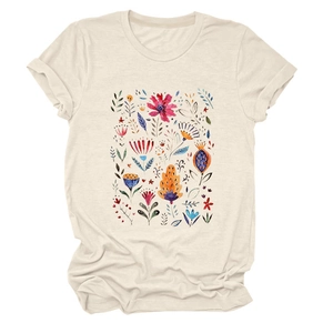 Detail of hand-painted floral print on beige short sleeve t-shirt with rolled cuffs