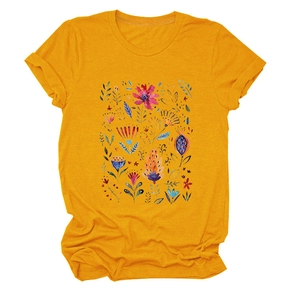 Close-up of hand-painted floral patterns on a bright yellow crewneck cotton t-shirt