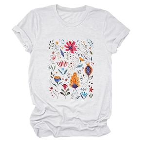 Detailed view of floral watercolor print on a white crew neck short sleeve T-shirt